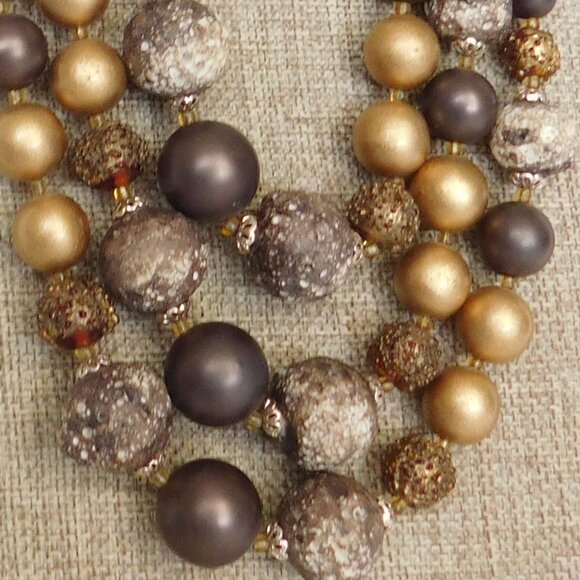 Vintage 3 strand bead necklace. Shades of brown and gold. Has moon glow beads - Picture 2 of 4